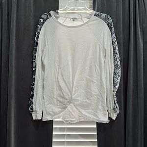 White top with snakeskin arms